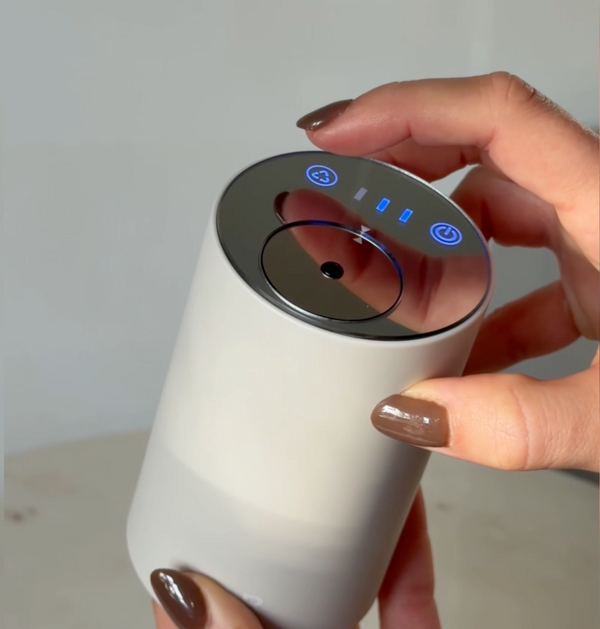 Press to activate, use the mist button to adjust mist level.